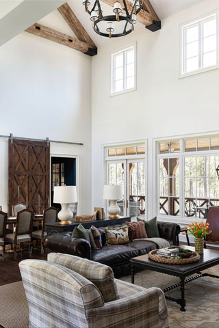 A cozy and warm living space with wood accents and beautiful natural textures