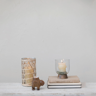 Rattan hurricane vase as a candle holder